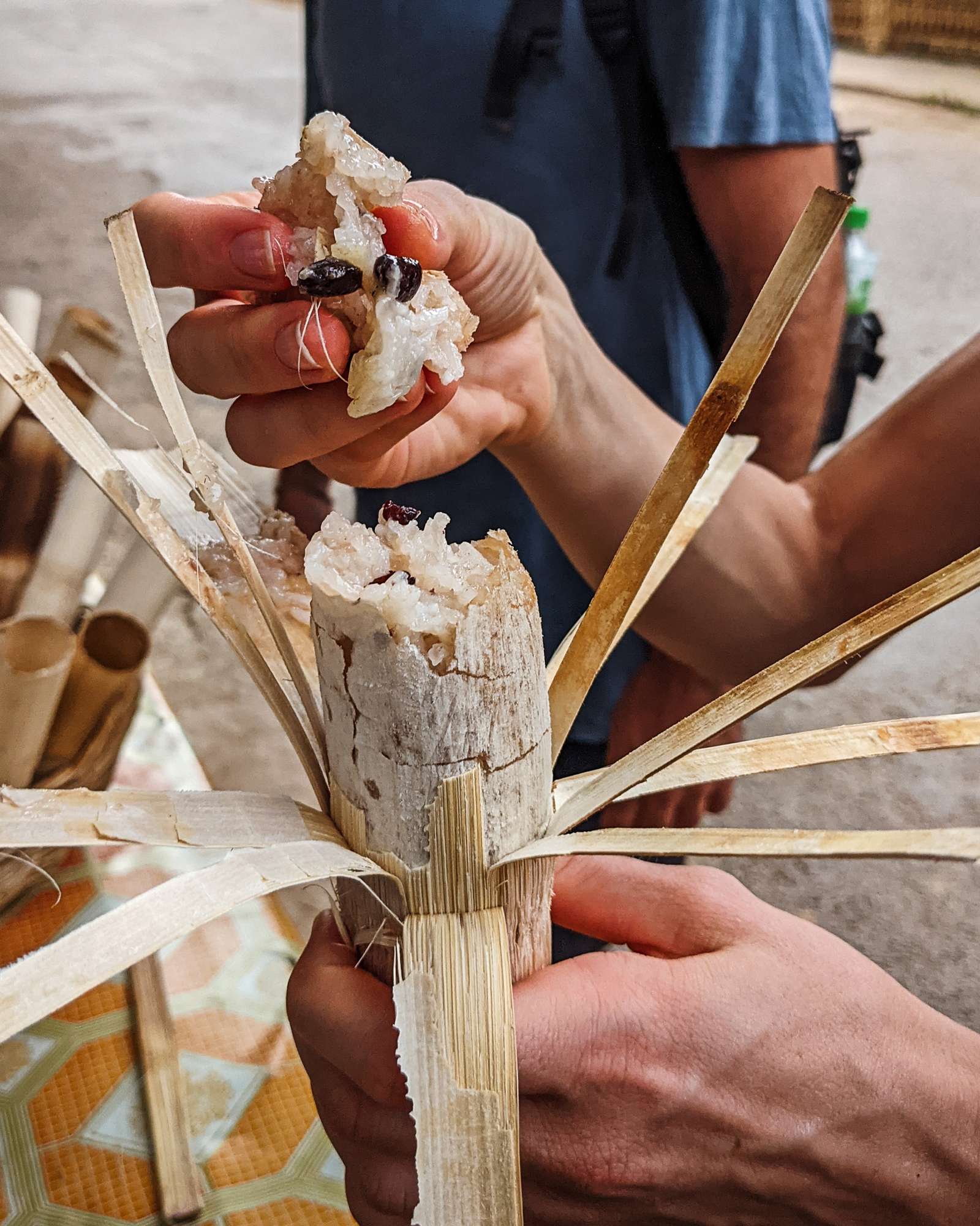 Coconut sticky rice with beans cooked in a bamboo