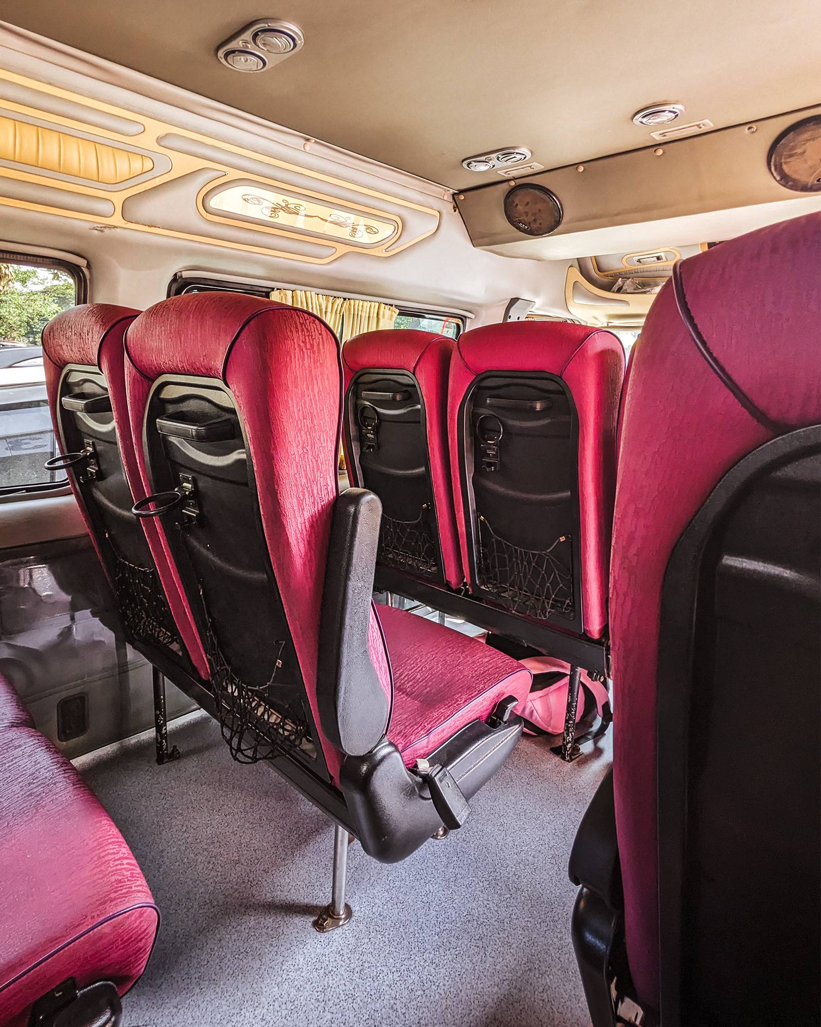 Passenger seats inside a van going from Phnom Penh to Kampot