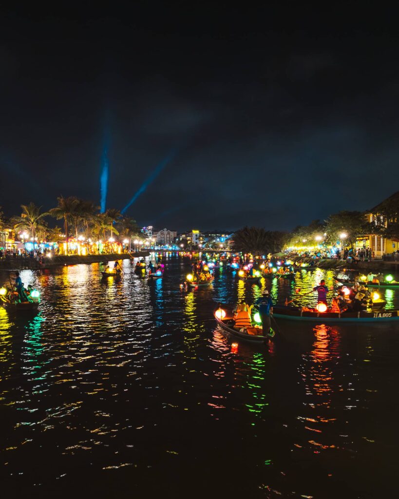 Boats and lanterns lighting up Hoi An at night